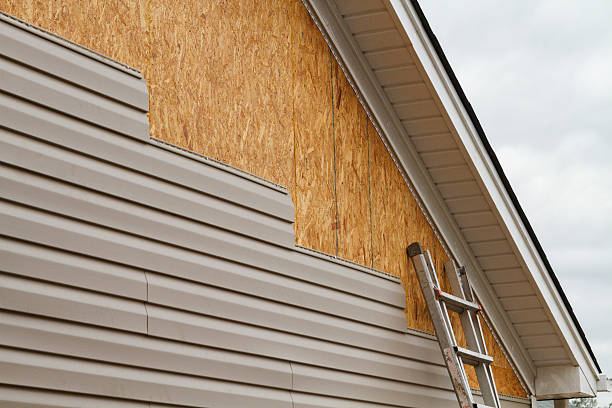Professional Siding technician working in College Park, GA